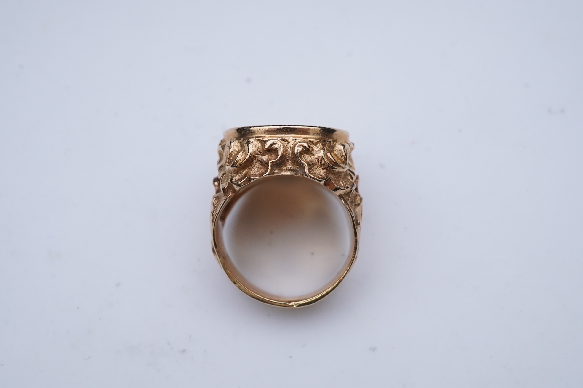 A gold peso coin ring